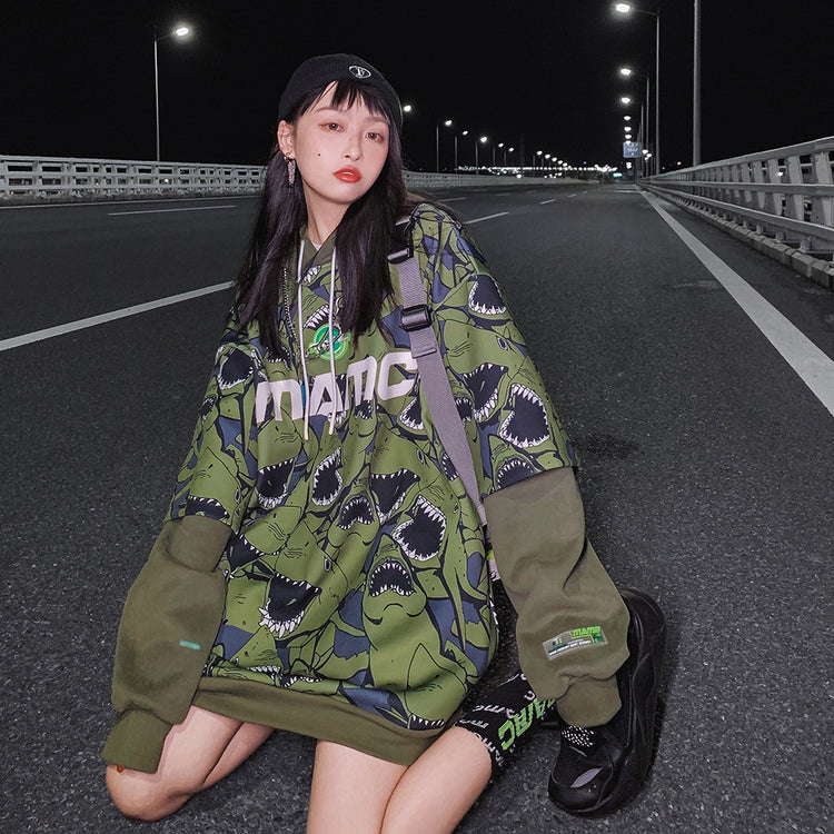 MAMC SHARKS layered-sleeve graphic hoodie, green, seated front outfit